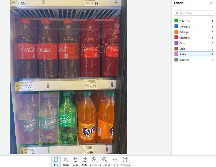The image shows how we draw corresponding bounding boxes for all the soft drinks in a vertical refrigerator.