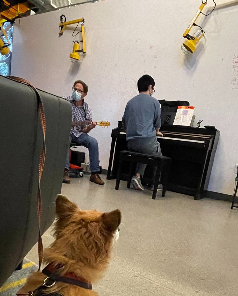 Resident quantum scientist Qubit the Dog taking part in a holiday sing-along.